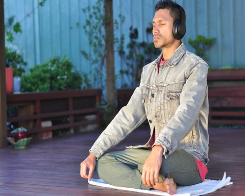 man practicing mindfulness and relaxation